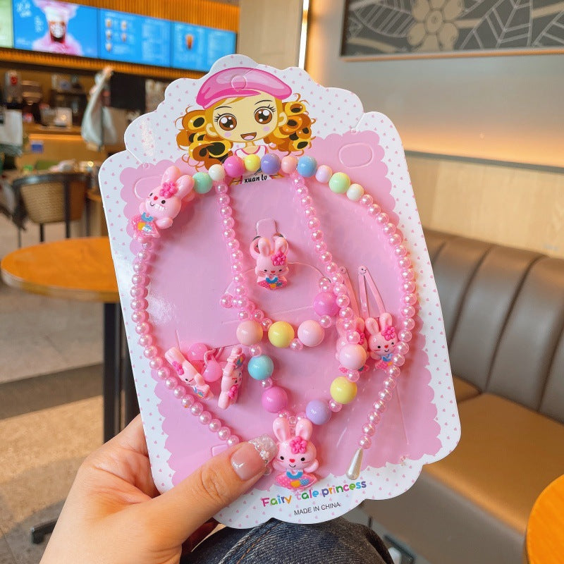 Best-selling cartoon children's beaded jewelry set, girls' pearl versatile necklace, ring, hair clip, hair tie accessories, imported from china