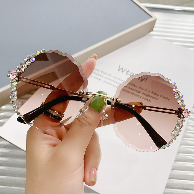 Frameless round sunglasses with cut edges, trendy design, UV protection, imported from china