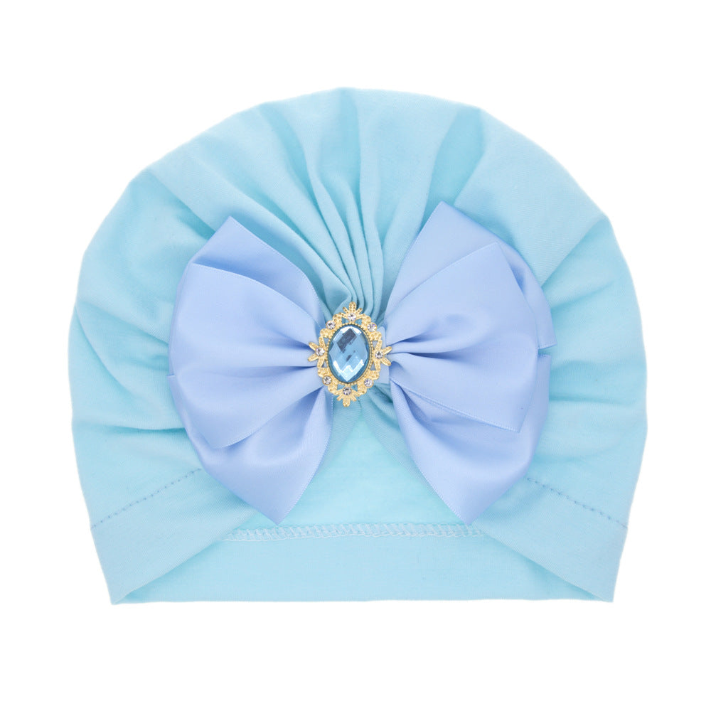 children's solid color rhinestone bow pullover hat, baby cap with bow, blue (ribbon style), imported from china