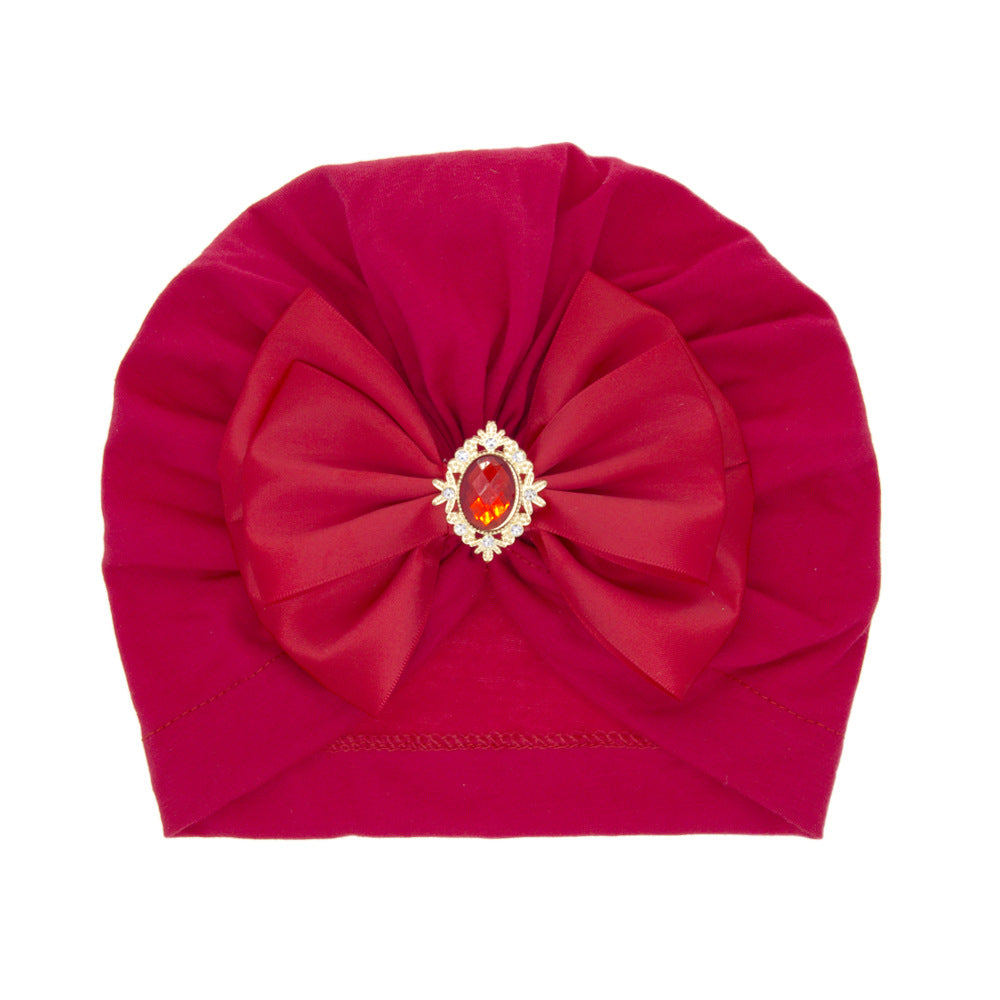 children's solid color rhinestone bow pullover hat, baby cap with bow, red (ribbon style), imported from china